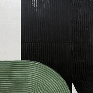 Close-up of ARCHES TRIPTYCH painting with ridged texture in black and sage green against white.