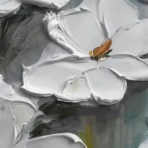 Close-up textured impressionist painting of white magnolia blossoms with impasto brushstrokes and yellow centers.