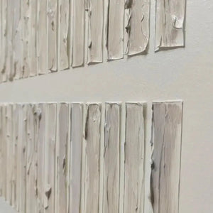 Close-up textured beige minimalist painting with thick, uneven vertical lines showcasing tactile surface detail.
