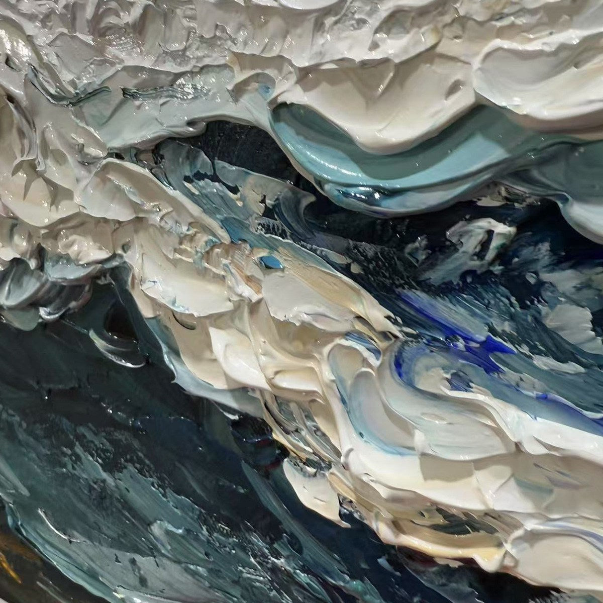 Close-up: 'Ocean Dream' abstract painting, textured ocean waves in blue, white, and gold by Liam O'Connell.