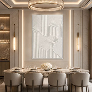 Textured white Wabi Sabi abstract wall art above a modern dining table