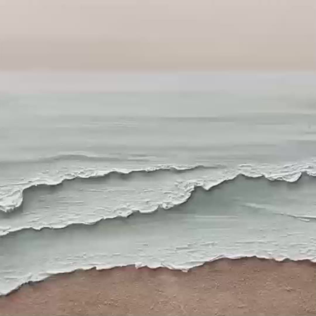 Liam O'Connell's Serene Shore painting: textured coastal landscape with beige waves and sandy shore, framed.