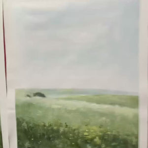 Set of 3 minimalist green field landscape paintings with gold frames, displayed in a modern room setting.