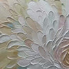 Textured impasto floral painting 'Petal Whirl' with swirling petals in cream, pink, blue-grey neutral tones, black frame.