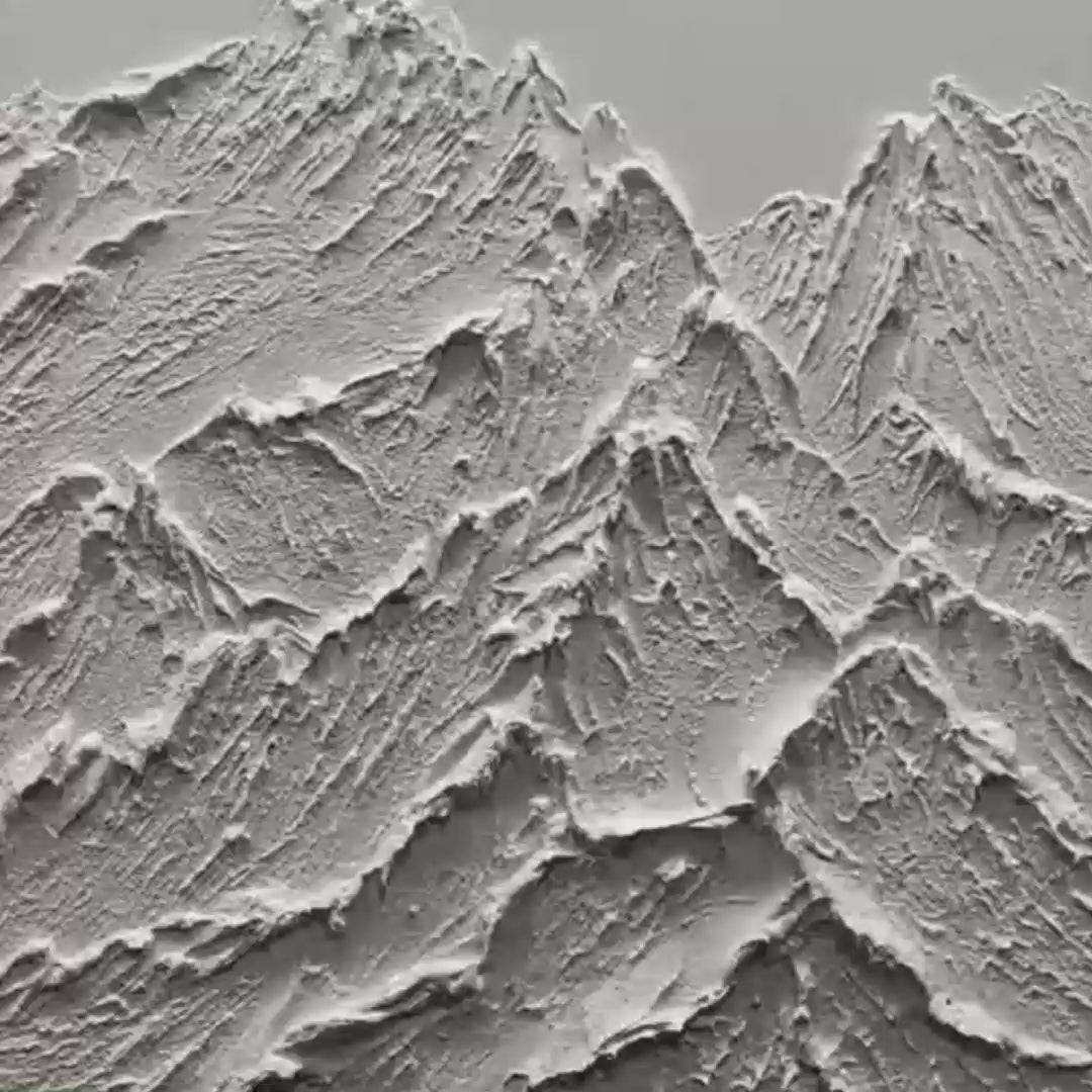 Textured white mountain painting with impasto, framed in gold. Liam O'Connell artwork.