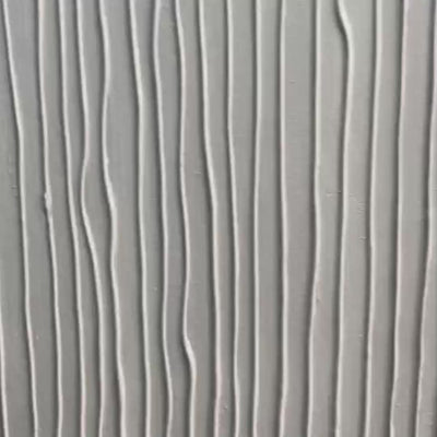 Textured beige painting by Javier Ramirez. Minimalist artwork with vertical and horizontal lines. Gold frame.