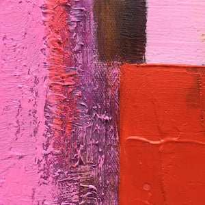 Close-up of Pink and Green Urban Abstract painting showing impasto texture and bold color blocks of pink, red, and purple.